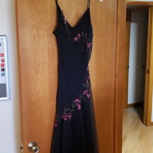 Black lined sequined dress with embroidered flower